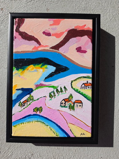 Colourful framed abstract landscape painting with houses, rolling hills and a winding blue river by Alpana Rai